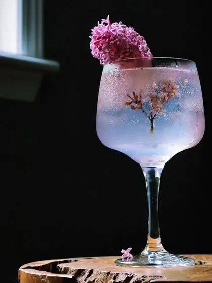 A whimsical and delicate gin and tonic. I place a sprig of cherry blossom inside the glass to create a miniature tree, making the drink a piece of art.