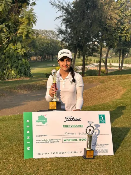Mahreen Bhatia holds her trophies after winning Category A at the 18th NCR Cup. Her victory at the AEPTA, Dhaula Kuan course is a result of her consistent hard work and dedication.