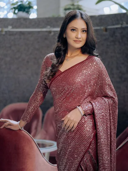 A confident and poised bride, ready for her engagement party.