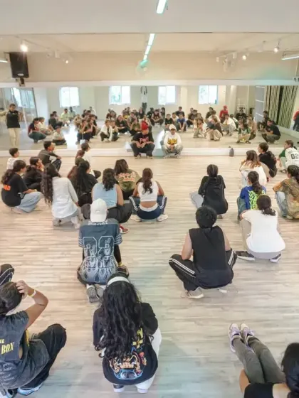 A wide view of the studio during a Collab Series 2.0 session. Our space is designed to handle large groups, giving everyone room to learn and move freely.