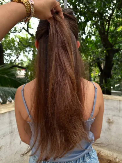 The ponytail test on Amyra Dastur's hair, showing the layers and length.