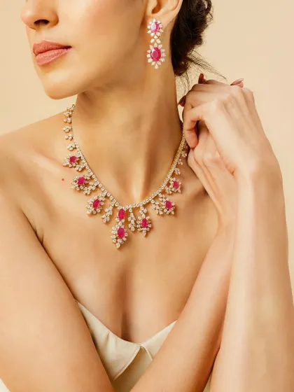 Crafted for moments that shine as bright as you. This ruby and diamond necklace set is a classic choice for adding a touch of glamour and colour.