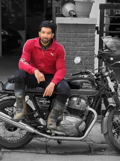 Sitting on my Royal Enfield Interceptor 650. This bike has a classic feel that's perfect for heritage rides, connecting the past and the present.