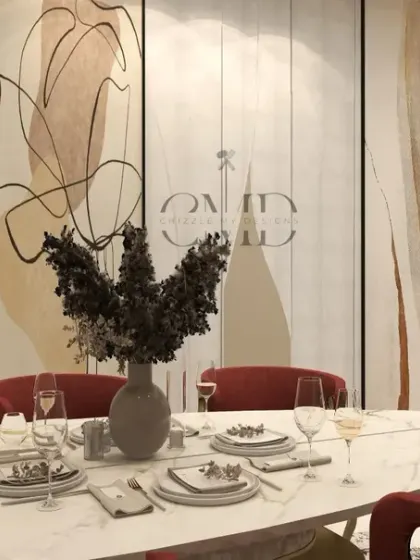This image shows the dining area's connection to the living space, with a custom art panel and warm wooden veneers creating a cohesive, sophisticated look.