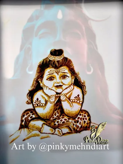 A cute depiction of Baby Shiva for the holy month of Sawan. When Shiva is drawn in mehndi, it's not just art but an expression of faith and emotion.