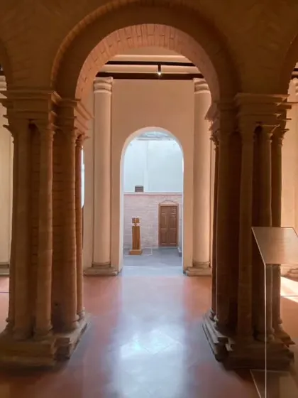 The arched hallway of the Sister Nivedita Museum, where restored brickwork and new bas-relief panels coexist. Our restoration philosophy involves a careful dialogue between the old and the new, respecting the building's original character.