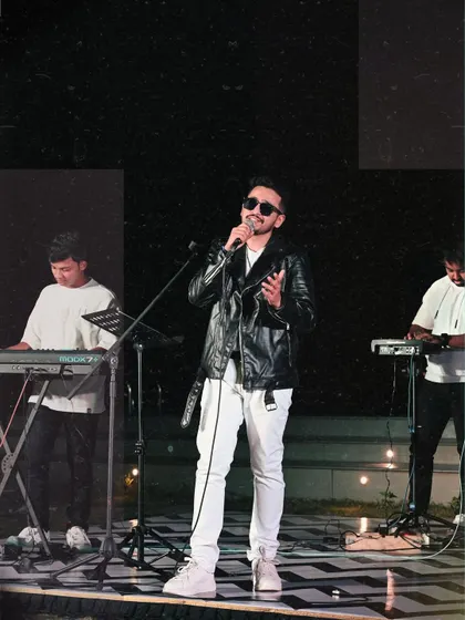 A stylish shot from a night performance with the band. We bring not just great music but also a professional stage presence to every event.
