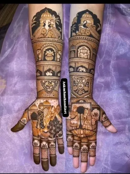 A grand and intricate design featuring wedding portraits, a lotus motif, and various traditional symbols, perfect for a royal bridal look.