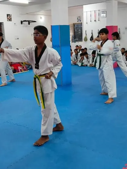 Students practicing their punches during a form.