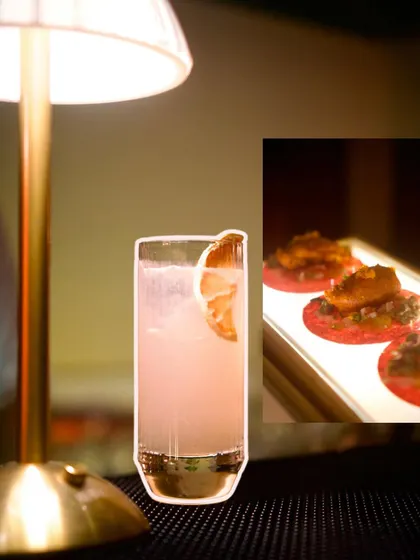 A duplicate of ID 103, this image reinforces the visual appeal of our new menu, pairing a beautiful pink cocktail with an artfully presented small plate.