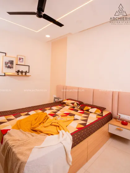 A perfect example of minimalist design. This bedroom uses a simple color palette and clean lines to create a serene and uncluttered space, proving that less is often more.