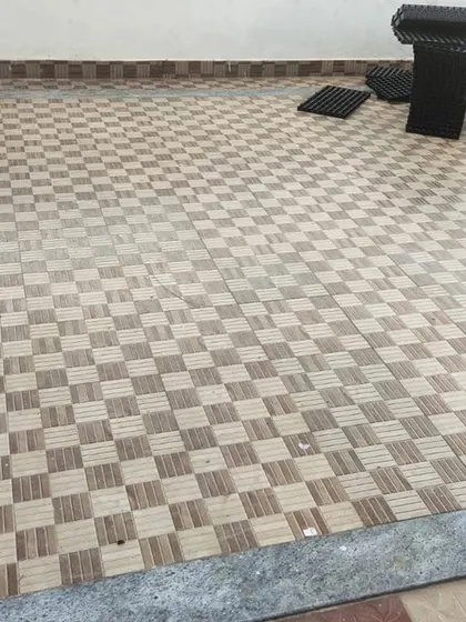 A bare balcony floor before we begin our transformation. This is the blank canvas we love to work with.