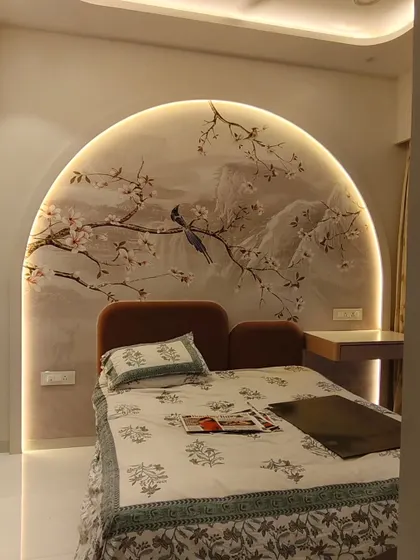 I love working on unique projects like this one in Nahur. I installed a delicate chinoiserie style wallpaper inside a custom-built arched niche, and the result is a beautifully framed piece of art, enhanced by the client's cove lighting.
