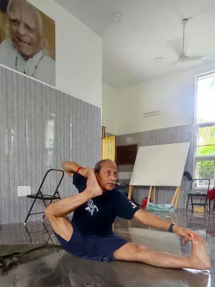 Eka Pada Raja Kapotasana (One-Legged King Pigeon Pose) in progress. This pose is a deep hip opener and backbend that requires patience and consistent practice.