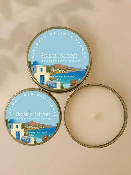 The 'Seaside Retreat' mini candle, with notes of eucalyptus, clove, and sea salt. It's like a mini vacation in a tin.