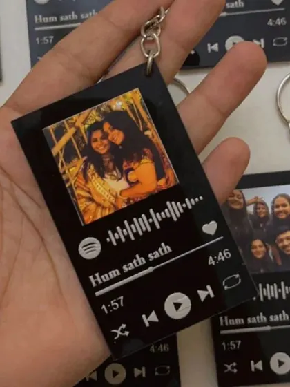 Carry your favorite song and memory with you everywhere. These custom acrylic keychains feature your photo and a scannable Spotify code.