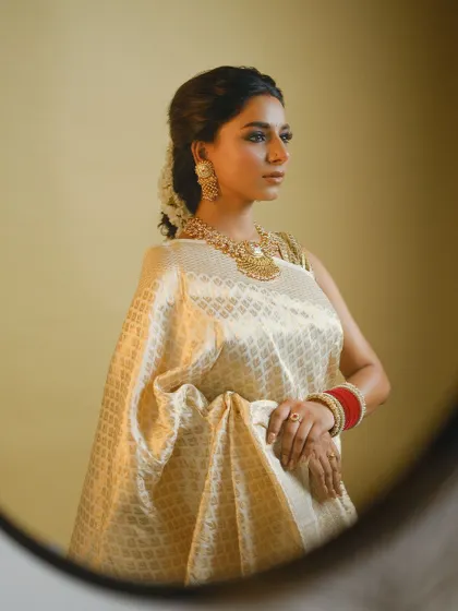 Another perspective of this versatile look, showing how the makeup and styling come together to create a sophisticated and traditional aesthetic.