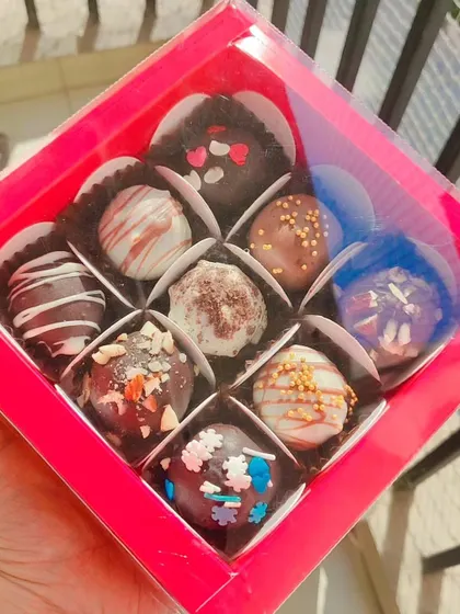 Sometimes, the simplest gifts make the biggest statement. This box of nine assorted, handmade chocolate truffles is a budget-friendly yet delicious option, perfect for everything from Rakhi gifts to casual thank you gestures.