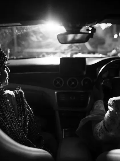 A quiet moment shared between the bride and groom as they begin their new journey together. I chose a black and white treatment for this in-car shot to emphasize the cinematic feel and the intimate connection between the couple, away from the wedding buzz.