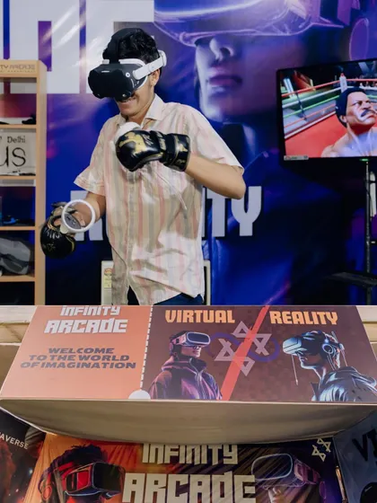 A player throws a punch in a VR boxing game at our IIT Delhi stall, demonstrating the fun we bring to events.