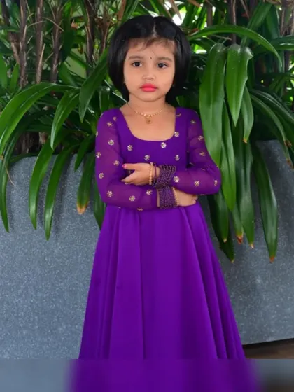 Serving some serious face in her custom gown. I designed this piece to be both comfortable and chic, using a flowy georgette fabric that's easy to move in while looking absolutely regal.