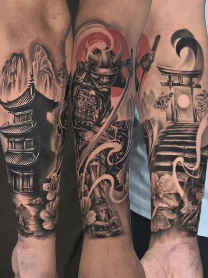 A closer look at a finished forearm cover-up. This Japanese-themed sleeve was designed to completely obscure a large, old name tattoo, creating a cohesive and dynamic piece from wrist to elbow.