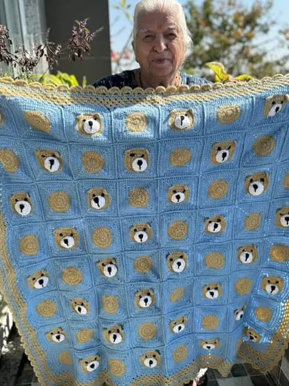 A beautiful blue and gold version of our teddy bear baby blanket. The colors can be customized to perfectly match your nursery decor.