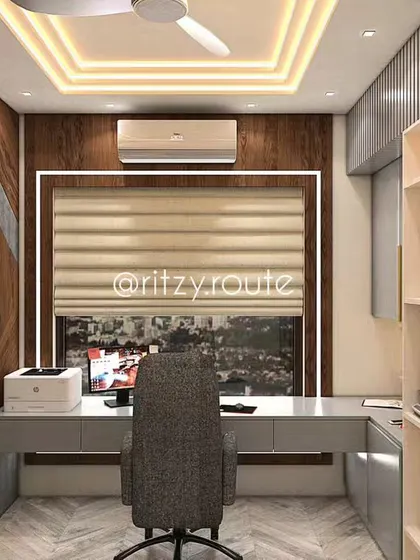 Would you like an office like this? This home office design features striking chevron-patterned wood walls, a floating desk, and a unique honeycomb shelving unit.
