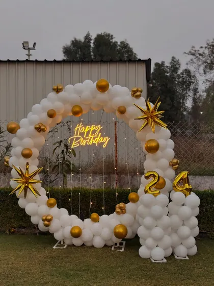 A duplicate image of the white and gold 24th birthday ring.