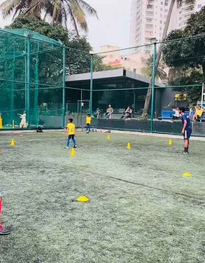 A player stands ready, focused on the drill ahead. We cultivate an environment of concentration and purpose.