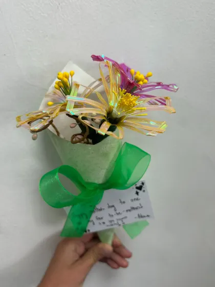 Another beautiful wire ribbon flower creation for Mother's Day. The shiny ribbons and delicate details make these bouquets truly special.