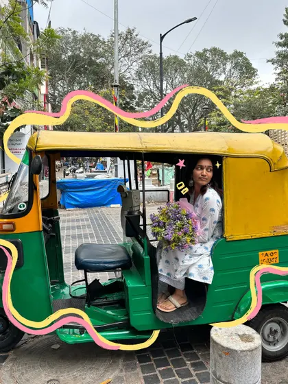 A classic auto-rickshaw ride with a bouquet of flowers, with doodles that capture the simple joy of the moment.