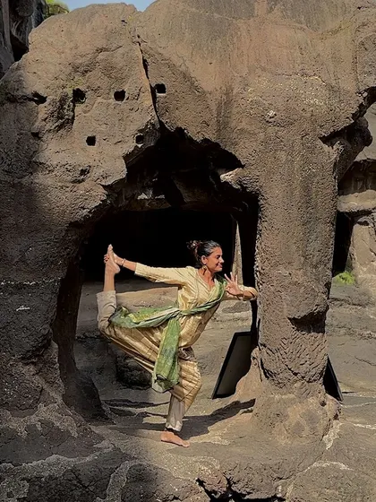 Striking a yoga pose within the ancient Ellora Caves. Being in such a historic and sacred space reminds me that yoga is a timeless practice that connects us to generations of seekers.