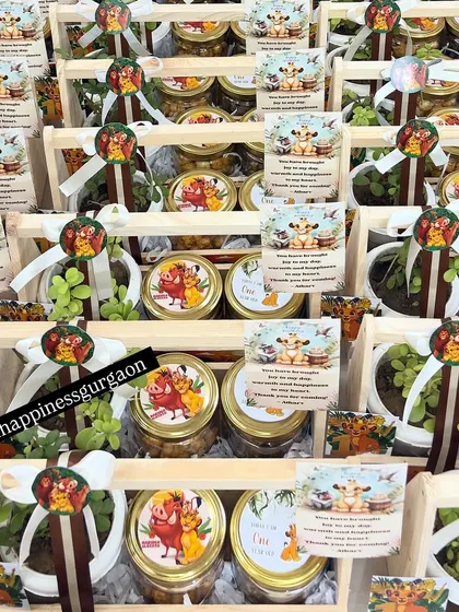 An overhead view of the 'Lion King' themed return gifts, showing the consistent and vibrant design across a large order.