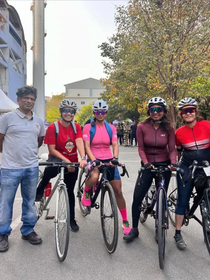 Posing with fellow cyclists at the She Cycles event. The camaraderie in the cycling community is one of its best aspects.