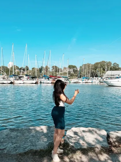 Looking out at the water and boats on a beautiful sunny day in Toronto.