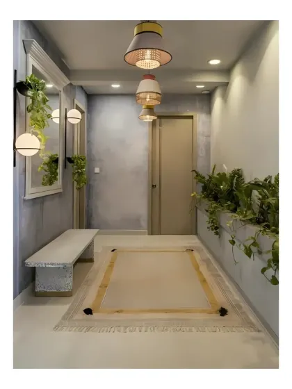 A hallway at Peninsula Heights where a long, built-in planter adds a continuous line of green. This biophilic corridor connects different parts of the home and makes the journey between rooms a pleasant experience.
