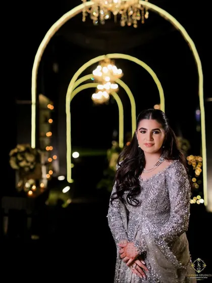 An atmospheric shot of the bride-to-be with her half-up hairstyle.