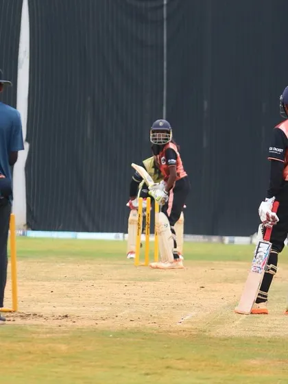 A view from behind the stumps during a youth practice match.
