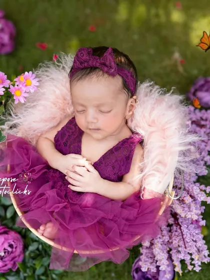 Another beautiful shot from the outdoor newborn session, with butterflies added to create an even more magical and dreamy atmosphere.