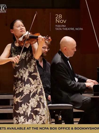 A stunning action shot of Midori and Özgür Aydın performing at the Tata Theatre, NCPA for the Zubin Mehta Celebrity Concert.