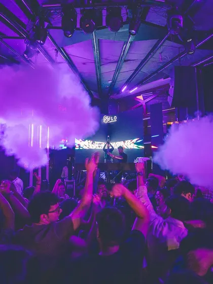 Purple smoke cannons create a mystical atmosphere on the dance floor. I use effects to match the mood of the music, from hype to ethereal.