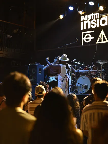 A view from the back of the house, watching the band connect with the crowd. It's a shared journey we all take together for the night.