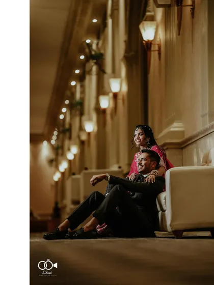 A duplicate of the relaxed and happy portrait of the couple in the hallway.