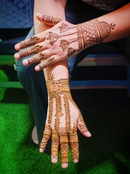 A creative shot of the minimalist mehandi, perfect for showing off at a party.