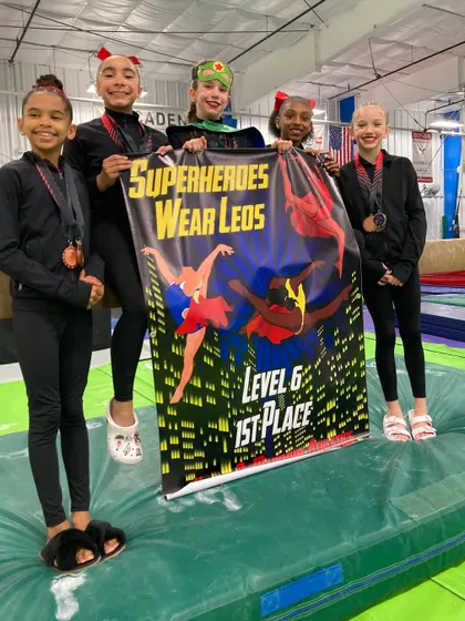 Our Level 6 team celebrates their 1st place win! These superheroes wear leos, and they proved it by dominating the competition.