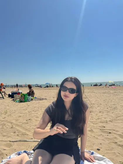 Happiest by the water, enjoying a sunny day at Saugeen Beach in Ontario.