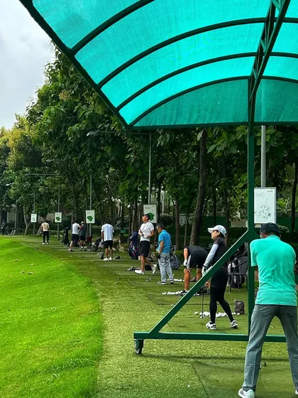 The covered bays offer shade and a great vantage point to watch the action on the driving range.