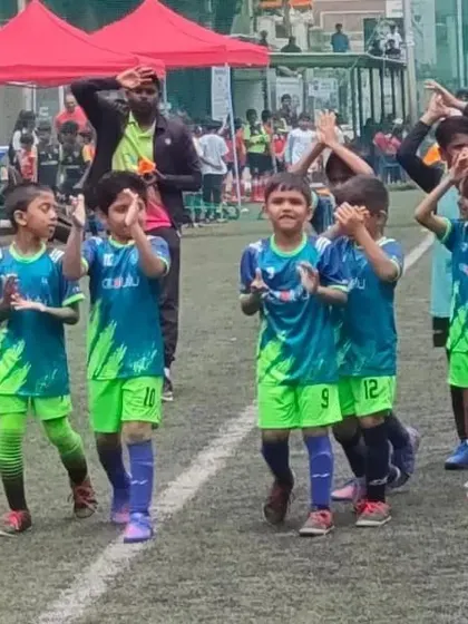 The pre-game hype! Our U9 football team gets energized and ready to take the field for their KSFA youth league game.