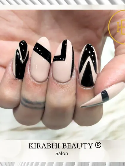 A duplicate image of the striking black and nude geometric nail art, perfect for those who love a modern aesthetic.
